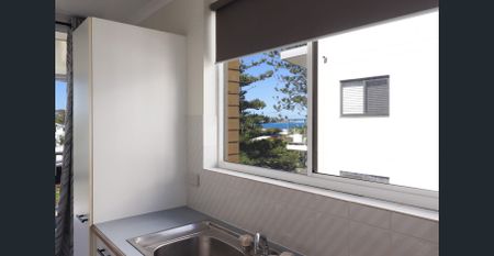 ENJOY SEA BREEZES AND OCEAN GLIMPSES - Photo 5