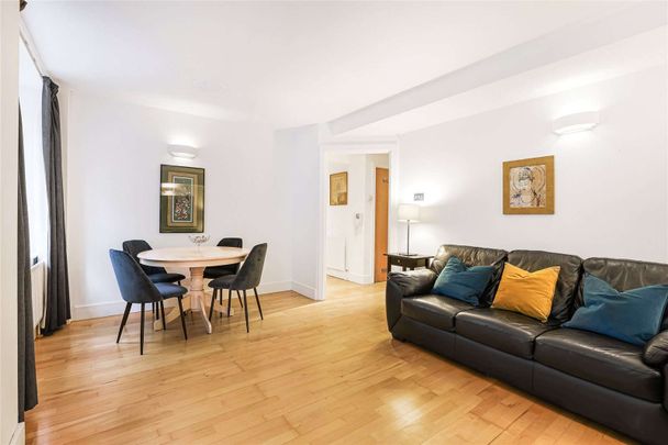 Two double bedroom apartment set on the ground floor of a portered building on a beautiful Westminster square. This contemporary property is fully furnished and well presented throughout. - Photo 1