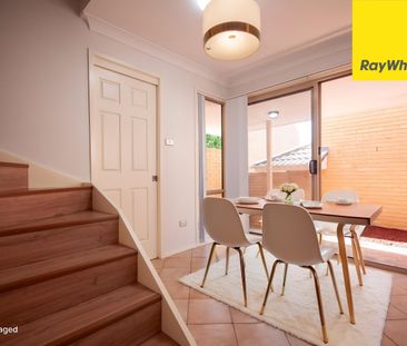 UPDATED STREET-FACING TOWNHOUSE WITH SPACE, STYLE & CONVENIENCE - Photo 2