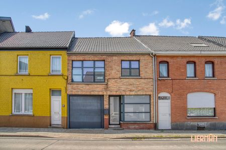 Instapklare woning met 2 SLKS, garage én grote zonnige tuin! - Foto 4