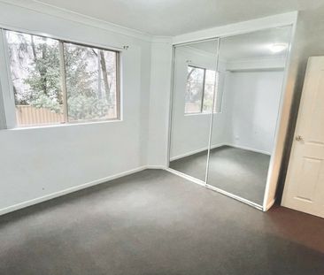 WELL PRESENTED GROUND FLOOR 2 BEDROOM UNIT! - Photo 6