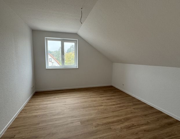 Obergeschosswohnung in einem charmanten Doppelhaus im Hörneweg! - Photo 1