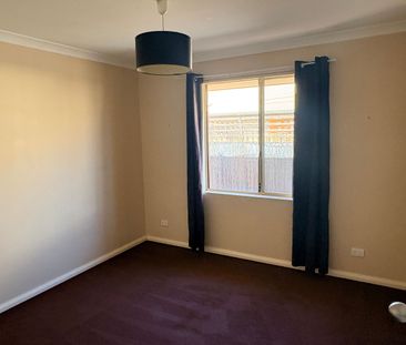 Low maintenance unit in a great location. - Photo 1