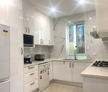 Spacious 4-Bedroom Family Home with Sunroom - Photo 2