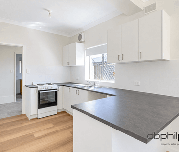 Renovated downstairs unit - Photo 3