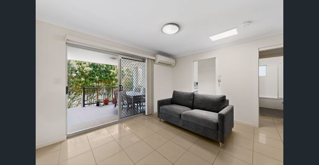 Easy Living with Private Courtyard in Holland Park West - Photo 1