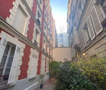 Location AppartementParis 18ème Grandes-Carrières - Photo 3