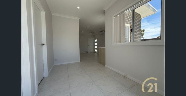 BRAND NEW, MODERN LIVING! - Photo 1