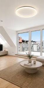 Erstbezug: Moderne 2-Zi-DG-Wohnung mit Balkon, Klimaanlage & Aufzug in 1100 Wien! - Photo 1