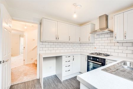 A three bedroom detached family home with an integrated garage and driveway parking in Leighton. - Photo 3