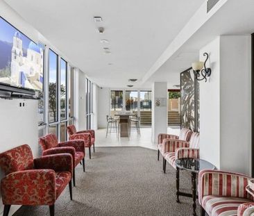 Light-Filled Luxury in Emerald Lakes Most Sought-After Building - Photo 5