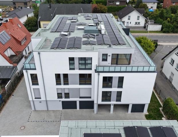 3-Zimmer-Neubau mit Balkon, PV-Strom & Schreinerküche – barrierefrei! - Foto 1