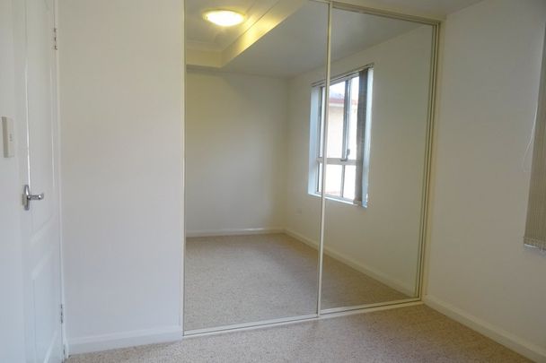 Modern 2 Bedroom Unit with Aircon - Photo 1