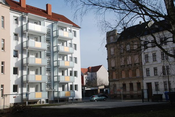 4-Raum-Wohnung mit Balkon und Einbauküche - Foto 1