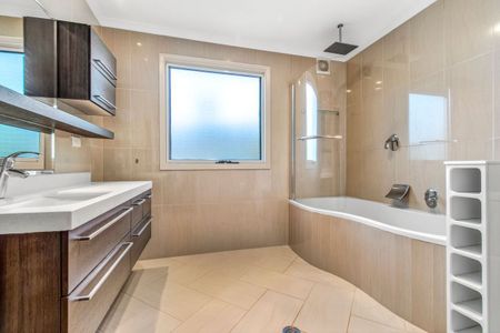 LIGHT-FILLED FAMILY RETREAT OFFERING SPACE AND CONVENIENCE - Photo 5