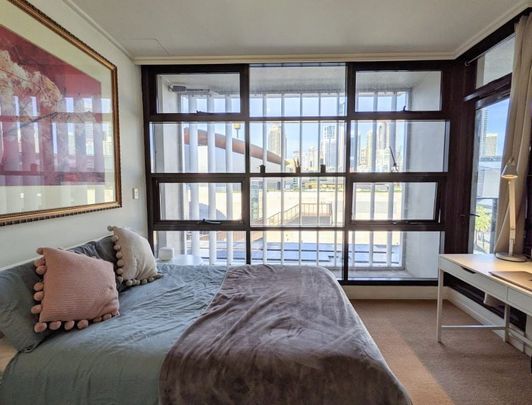 FABULOUS ONE BEDROOM + STUDY APARTMENT WITH CITY VIEWS + LARGE ENTERTAINING BALCONY - Photo 1