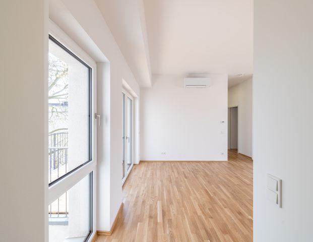 Tolle 3-Raum-Wohnung mit Dachterrasse, Balkon & Klimaanlage - WE19 - Photo 1