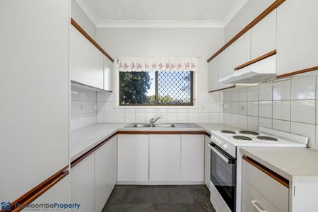 This impeccably presented brick townhouse is sure to impress! - Photo 3