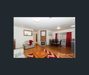 Comfortable 3-Bedroom Home with Modern Kitchen & Secure Features - Photo 2