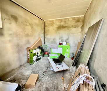 GELIJKVLOERSAPPARTEMENT MET TWEE SLAAPKAMERS EN GARAGE - Photo 4