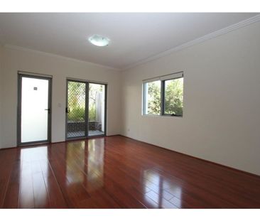 Spacious Two Bedroom Townhouse with Three Car Garage - Photo 3