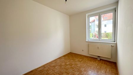 Helle Erdgeschosswohnung mit charmanter Freifläche - Foto 5