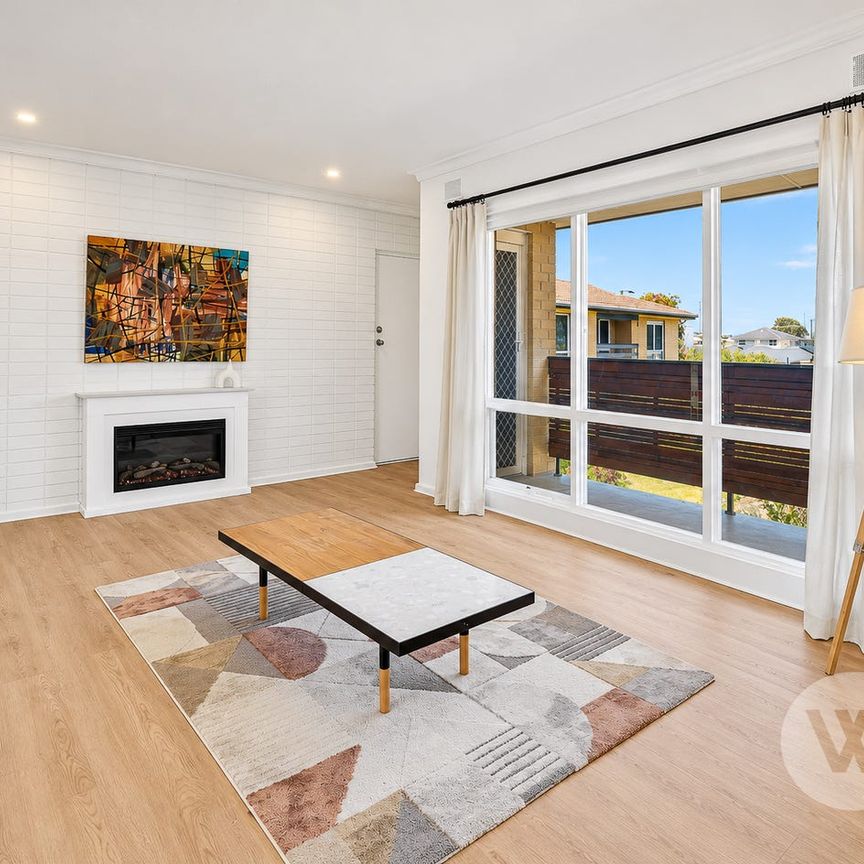 BEAUTIFULLY RENOVATED FIRST FLOOR LIVING IN THE HEART OF GRANGE - Photo 1