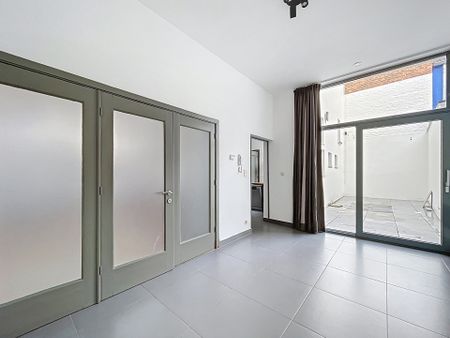 Gelijkvloerse verdieping met één slaapkamer in Tournai - Photo 4