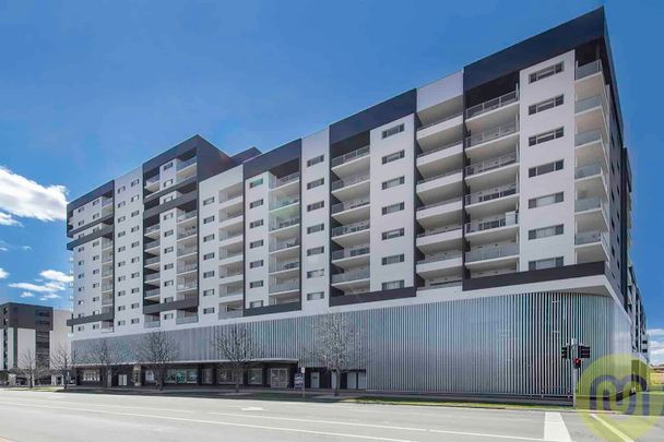 One Bedroom Apartment with Large Balcony in Resort Style Complex - Photo 1