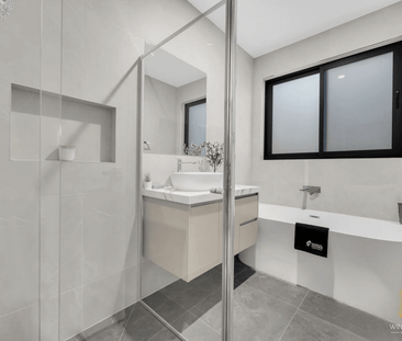 Spacious Family Home with Modern Comfort and Style - Photo 2