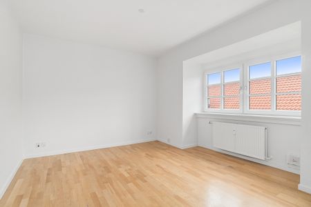 Skøn og lys lejlighed på øverste etage - Foto 4