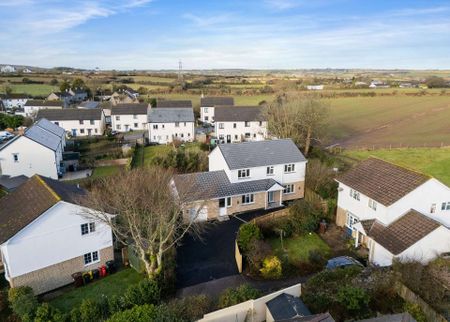 Please email to register your interest - a detached, four bedroom house with garage in the rural village of Stithians. - Photo 2