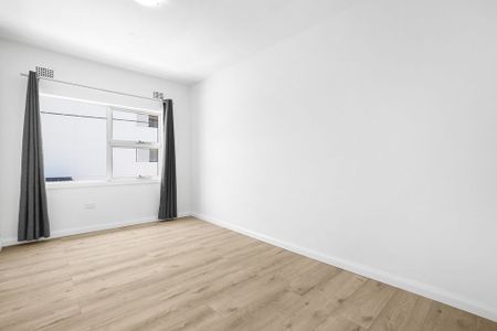 Newly Renovated Oversized Apartment in Great Location - Photo 3