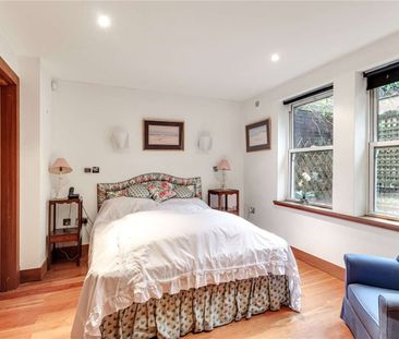 A ground floor two bedroom apartment in this centrally-located land... - Photo 3