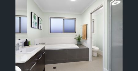 Coastal Living Meets Modern Comfort - Your Redcliffe Oasis Awaits! - Photo 5