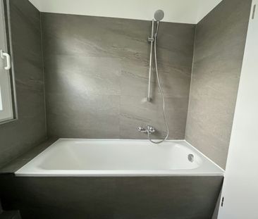 Helle Erdgeschosswohnung – mit Einbauküche und Pachtgarten auf Wunsch - Photo 1