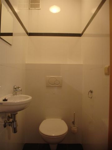 Mooi appartement met 2 slpk's in centrum Sint-Truiden, vlakbij station. - Photo 5