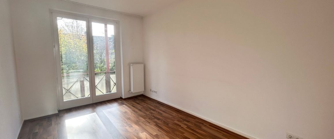 Schöne Etagenwohnung mit Balkon - Foto 1