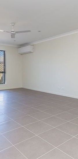 Neat 3 Bedroom Duplex in Sought After Location - Photo 1