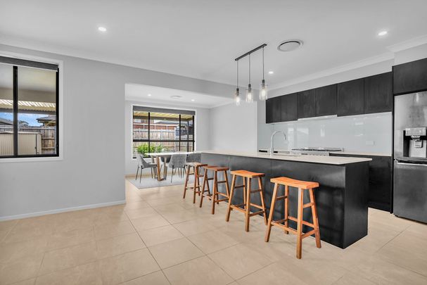 Family Home With Multiple Living Spaces! - Photo 1