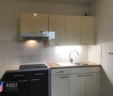 Location appartement récent 3 pièces 63.11 m² à Scionzier (74950) 6 - Photo 1