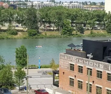 A Furnished with River View in EVOLUTION East Village! | 604 - 519 Riverfront Ave SE, Calgary - Photo 1