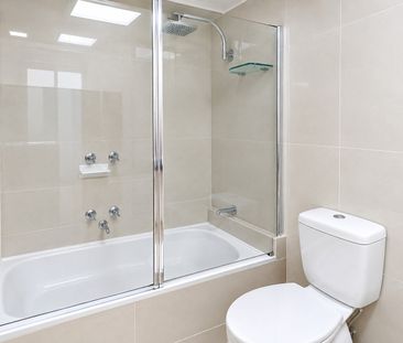 Stylish & Spacious Living in the Heart of Carnegie - Photo 6