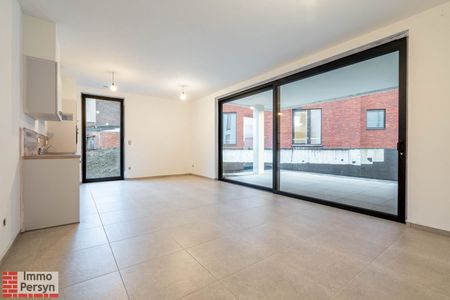 Gelijkvloers nieuwbouwappartement met terras en tuintje - Foto 4