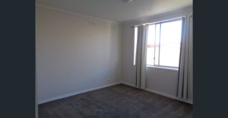 Beautifully Renovated 2-Bedroom Unit in Prime Deer Park Location! - Photo 4