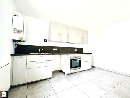 Location Appartement 4 pièces 90m² HAUCOURT MOULAINE 54860 - Photo 2