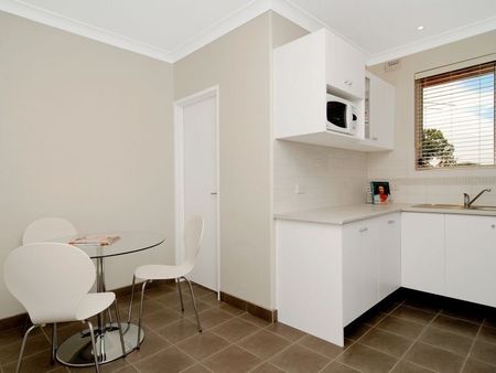 Stylish Two Bedroom Unit With Balcony - Photo 5