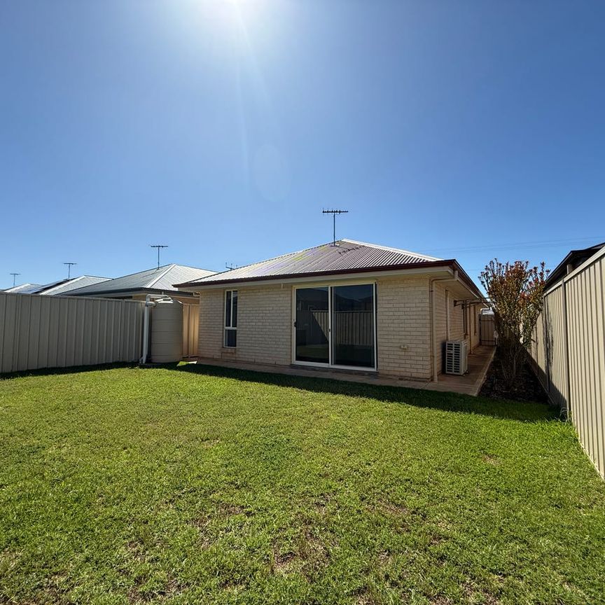 Modern 3-Bedroom Home with Open Living and Private Backyard - Photo 1