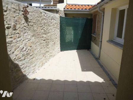 Loue Appartement à Port-Saint-Père T2 RDC - Cour fermée - Photo 3