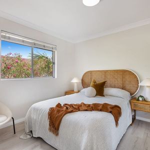 Top Floor Coastal Living with Light, Privacy and Lifestyle Convenience - Photo 2